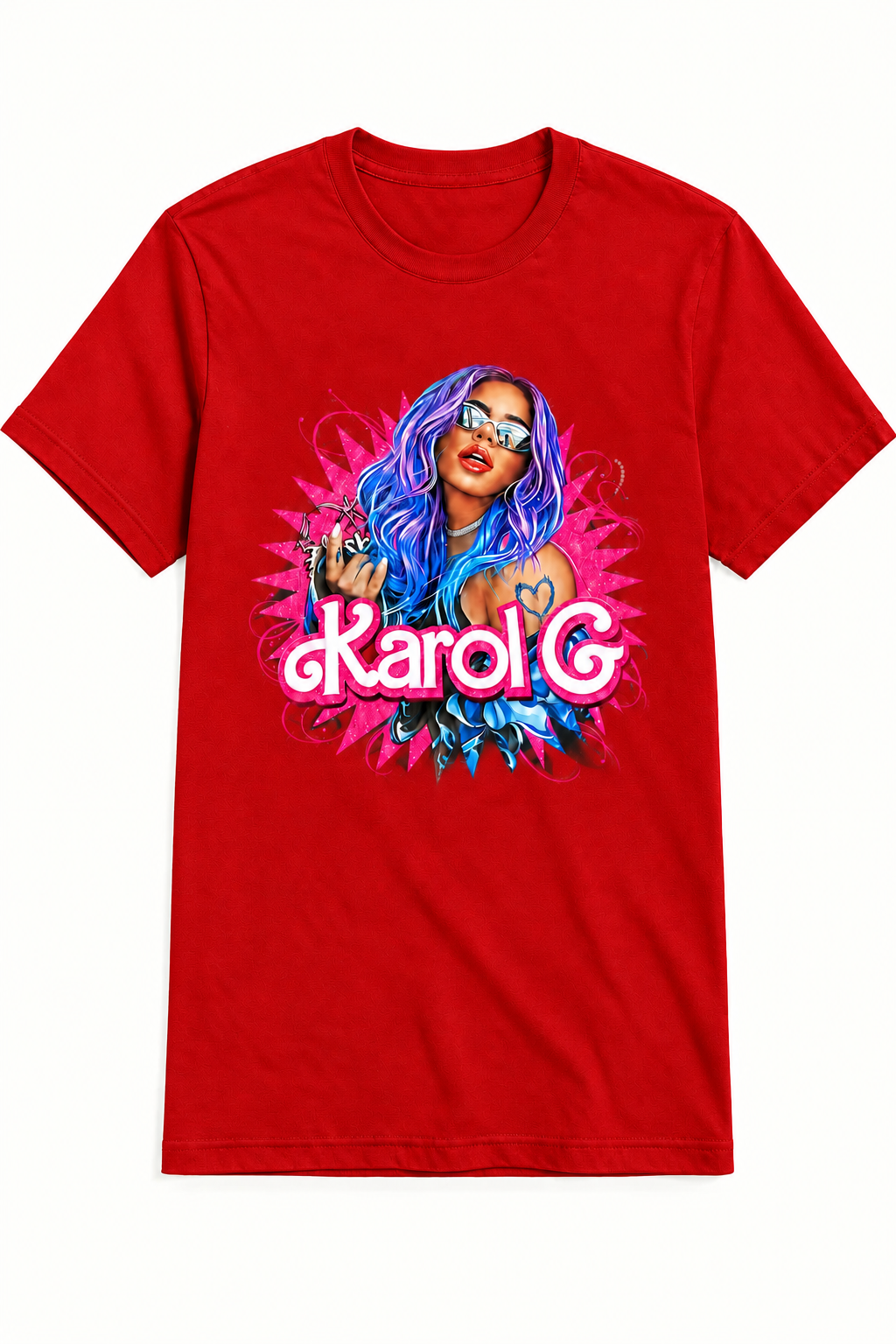 A red short-sleeve crewneck t-shirt featuring a colorful graphic print of a woman with blue hair and sunglasses, with the text 'Karol G' in pink and white across the front.