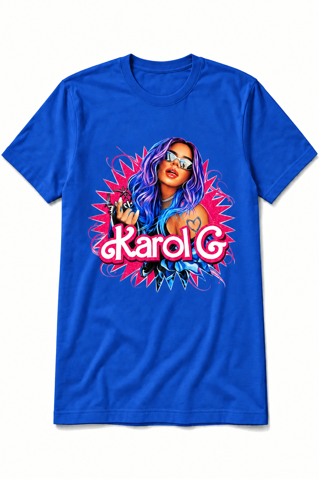 A royal blue short-sleeve t-shirt with a colorful graphic print of a woman with purple hair and the text 'Karol G' on the front, displayed against a clean white background.